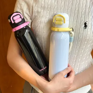 Detailed shot of portable insulated water bottle with strap, cute straw design for kids.