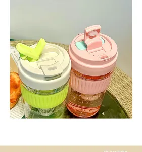 Cute dual-drink plastic water bottle with straw, high temperature resistant Tritan cup.