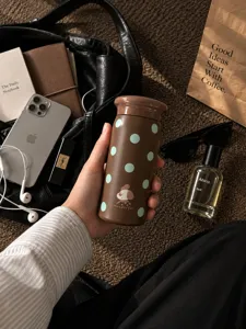 Mini brown polka dot thermos cup, portable vacuum flask for daily office and school use.