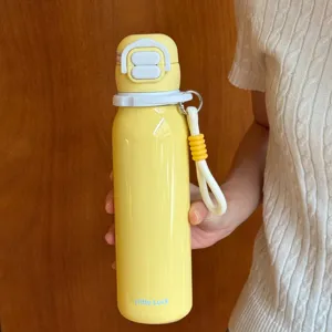 Portable yellow children's thermos water bottle with strap, cute straw cup for school students.