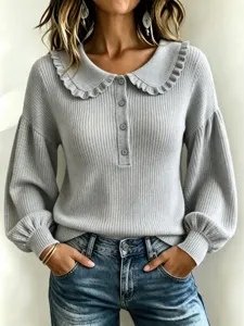 Grey ribbed knit top detail, featuring a stylish ruffled collar and front buttons for women.