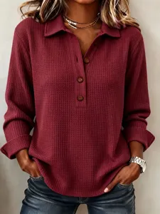 Casual waffle knit long sleeve top for women with lapel collar and button placket design.
