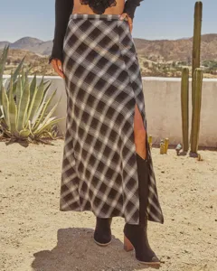 Detailed view of the vintage plaid high-slit long skirt featuring a chic side split design.