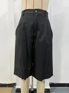 Solid black suit shorts for women, high waist, pleated design, casual five-point length.