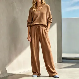 Waffle knit loungewear set featuring long sleeve top and wide leg pants for women.