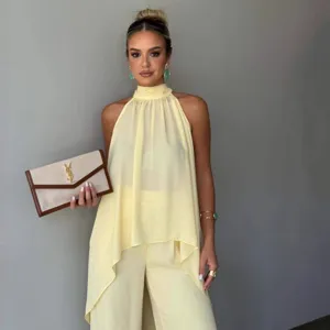 Elegant summer solid color sleeveless irregular top and matching pants set for women daily wear