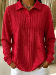 Red waffle knit polo long sleeve top for women, casual loose button lapel fashion apparel.