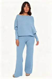 Cozy light blue off-shoulder knit sweater and flare trousers two-piece set for women.