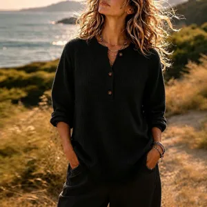 Casual waffle knit Henley long sleeve top, relaxed fit button-up pullover for women detail view.