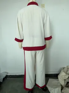 Detail view of the back of the color-blocking casual loose top and wide-leg trousers set.