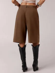 Detailed view of women's brown casual suit bermuda shorts, comfortable loose five-point fit.