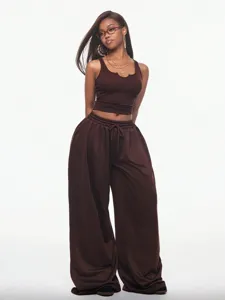 Details of the brown ribbed cropped tank top and wide leg sweatpants two piece outfit.