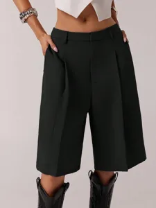 Stylish black pleated suit shorts for women, casual summer high waist bermuda pants style.