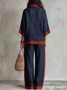 Stylish color-blocked linen casual two-piece suit with loose top and wide-leg trousers.