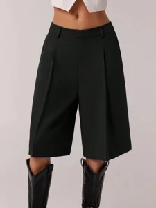 Solid color casual loose suit shorts for women, perfect for summer chic commuting styles.