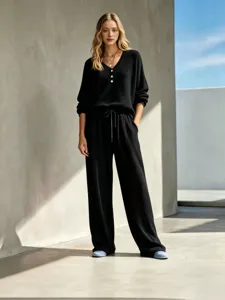 Black waffle knit loungewear two piece set long sleeve top and wide leg pants main view