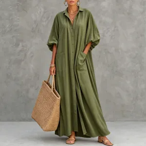 Elegant olive green maxi shirt dress featuring long bubble sleeves and large pockets for women.