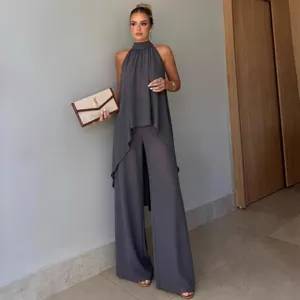 Chic and elegant women grey halter sleeveless asymmetric tunic top and wide leg set.