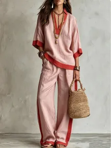 Detailed view of the women's pink and red linen casual two-piece outfit with wide-leg pants.