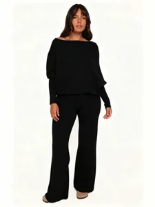 Black off-shoulder knit sweater and flared pants two-piece lounge set for women main view.