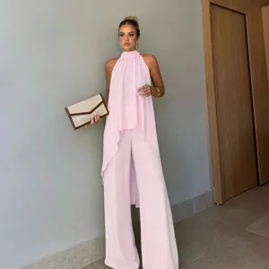Elegant summer pink halter sleeveless irregular top and wide-leg pants two-piece set.