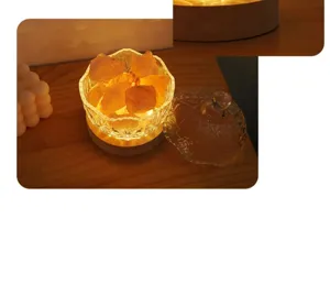 Crystal salt stone aromatherapy lamp with wooden base and glass cover for bedroom decor.