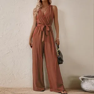 Sleek detail view of women's sleeveless wrap V-neck jumpsuit with a stylish waist tie.