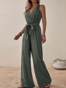 Sleek sleeveless V-neck jumpsuit featuring a chic belted high waist and wide leg design.