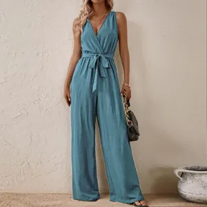 Detailed view of the stylish sleeveless V-neck jumpsuit with waist tie and wide legs in blue.