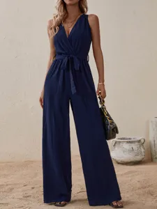 Stylish navy blue sleeveless V-neck jumpsuit with waist tie for women casual wear summer outfit.