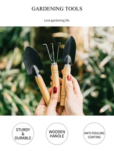 Mini gardening tools set detail shot featuring metal small shovels and wooden handles for plants.