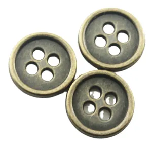 Wholesale antique brass metal buttons, four-hole round sewing buttons for garments and crafts.