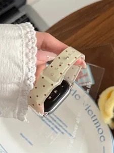 Detail view of jelly polka dot TPU watch band compatible with Apple smart watch devices.