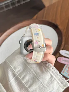 TPU watch strap detail featuring cute bear and ice cream print, smooth surface close-up view.