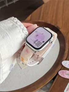 Detailed close-up of cute cartoon bear TPU watch strap, soft texture and lovely bow design.