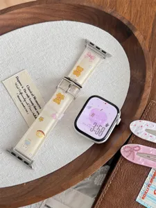 Cute cartoon bear TPU watch strap compatible with Apple Watch series, stylish detail shot.
