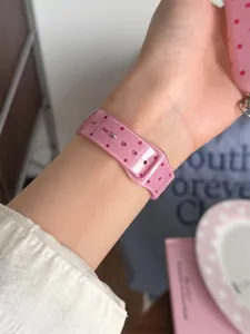 Pink translucent polka dot TPU sports watch band compatible with smartwatches, soft and stylish.