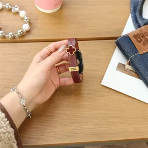 Genuine leather clover smart watch replacement strap accessory for daily wear fashion.