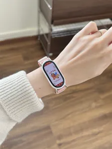 Roze nylon gevlochten vervangingsbandje geschikt voor diverse slimme fitness trackers en horloges.