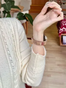 Plaid leather watch band with cute bear charm compatible with smartwatches wrist strap accessory.