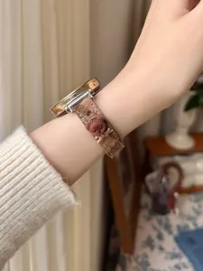Brown plaid smartwatch replacement band featuring cute 3D bear charm, comfortable detail view.