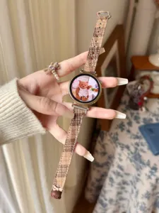 Compatible plaid watch strap with cute bear charm for smart watch accessory detail view.