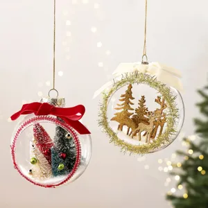 Transparent clear Christmas tree hanging ball ornaments with miniature forest scene decor.