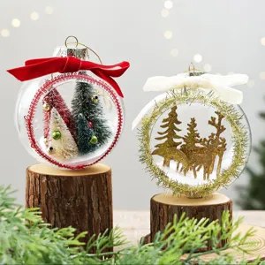 Clear Christmas ball ornament with miniature landscape inside, perfect holiday tree hanging decor.