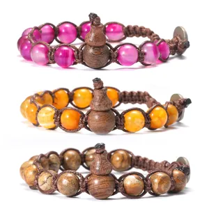 Ensemble de bracelets tressés en pierre naturelle et gourde en bois, bijoux élégants.