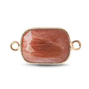 Gros plan d'un connecteur en pierre naturelle rectangulaire avec boucles dorées pour bijoux.
