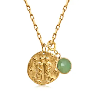 Collier en acier inoxydable doré avec pendentif pièce zodiaque Gémeaux et pierre porte-bonheur.