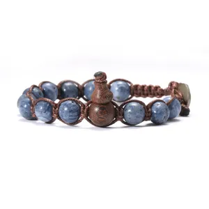 Bracelet en pierre naturelle fait main avec pendentif gourde en bois et cordon tressé.