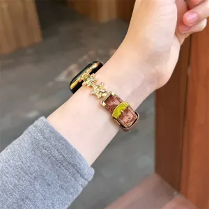 Bracelet de montre étoile en métal et velours luxueux pour Apple Watch, vue élégante.