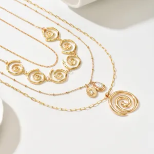 Detailed view of the French vintage gold multi-layered spiral necklace, exquisite craft.